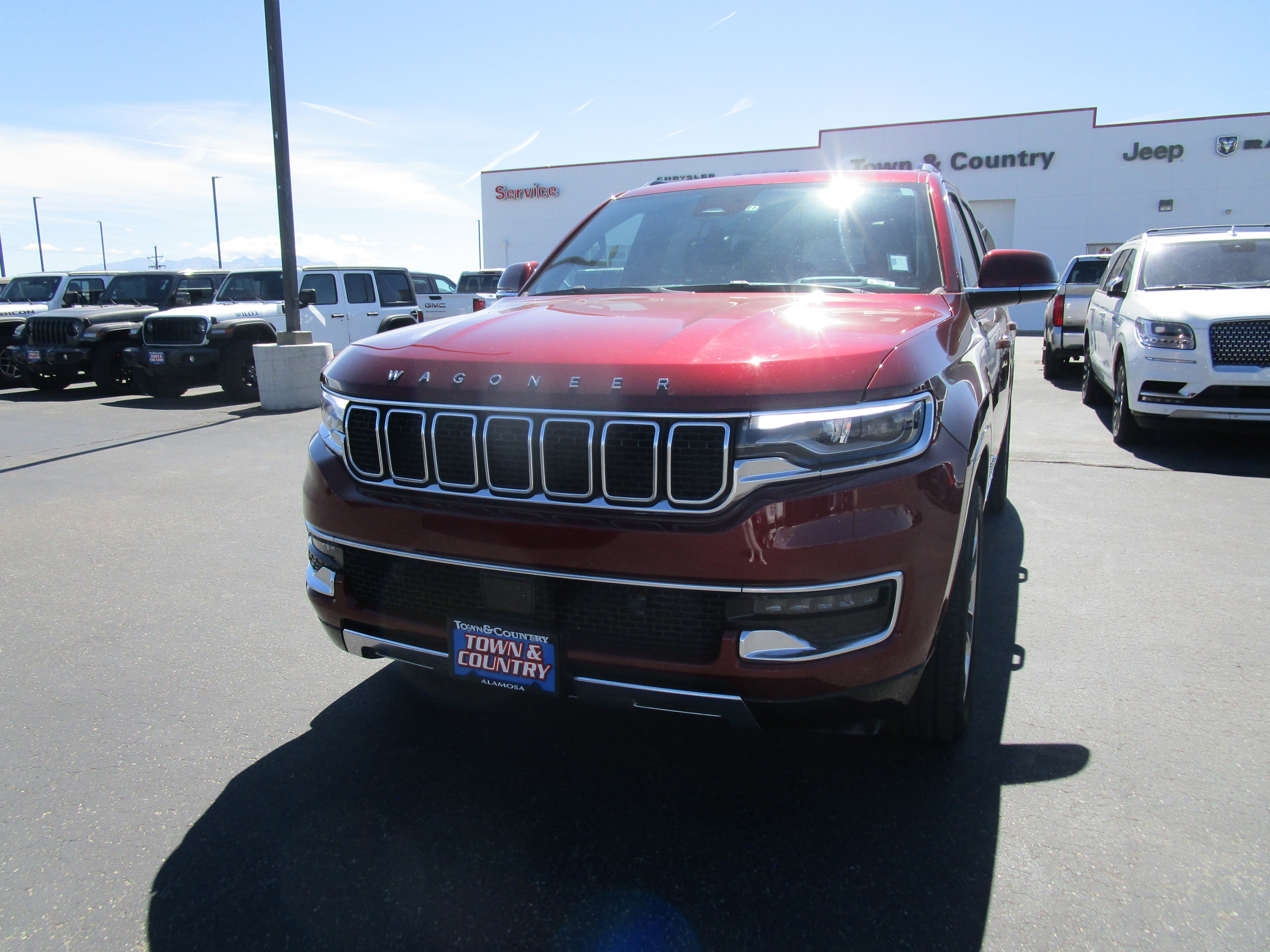 2022 Jeep Wagoneer Series III in Velvet Red — front three-quarter view