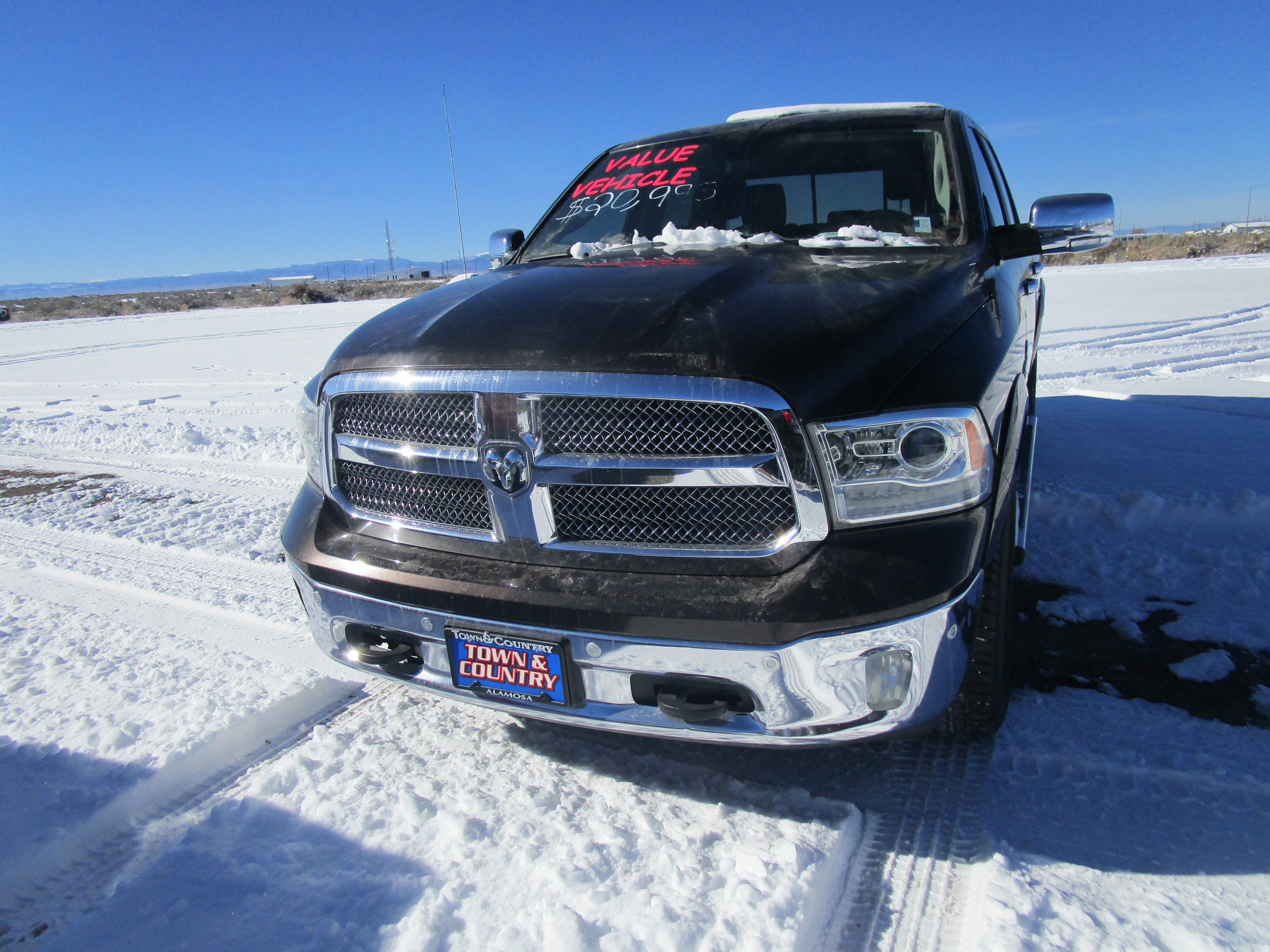 2017 RAM 1500 Longhorn in Beige — front three-quarter view