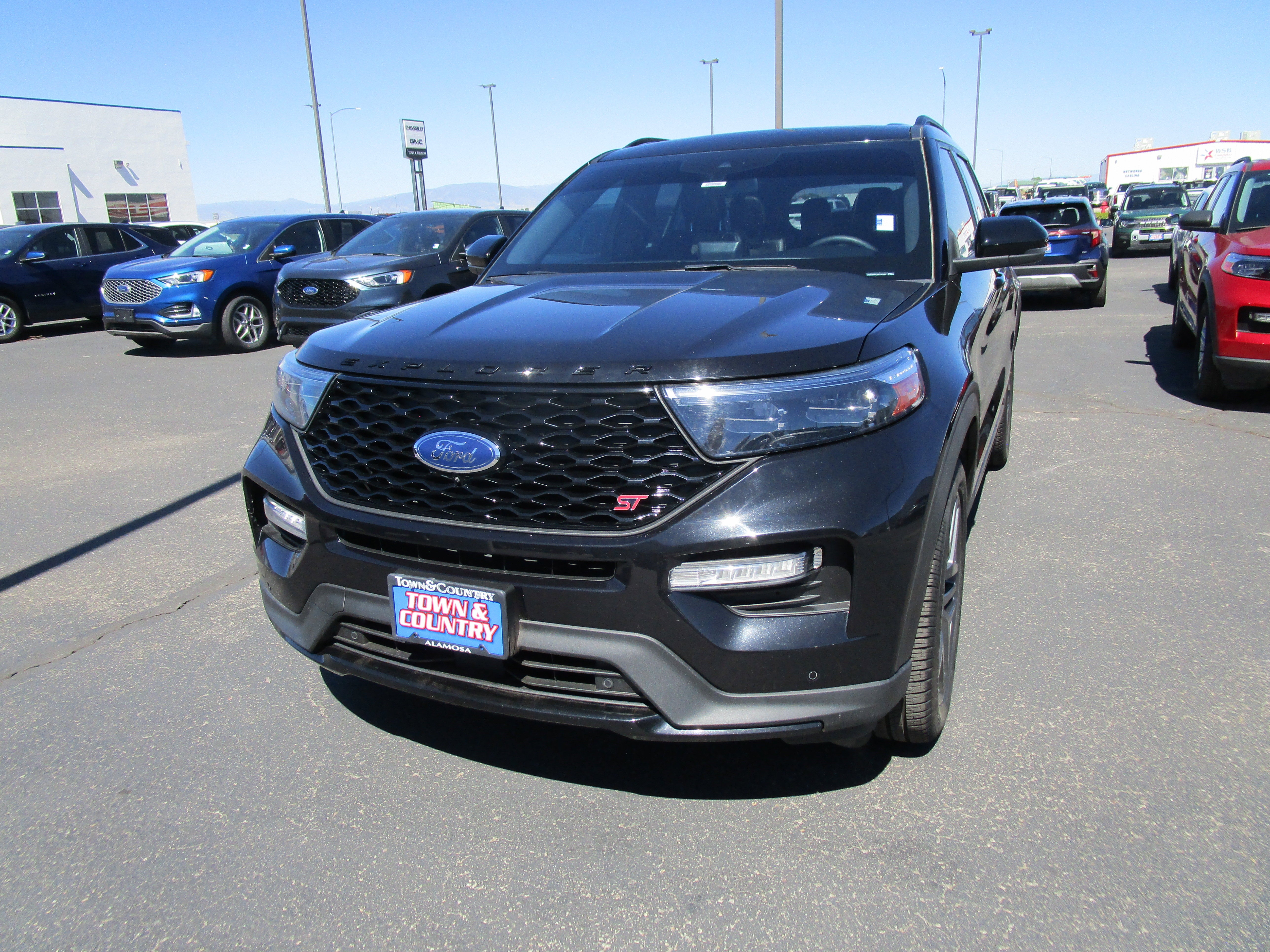 2022 Ford Explorer ST in Agate Black Metallic — front three-quarter view