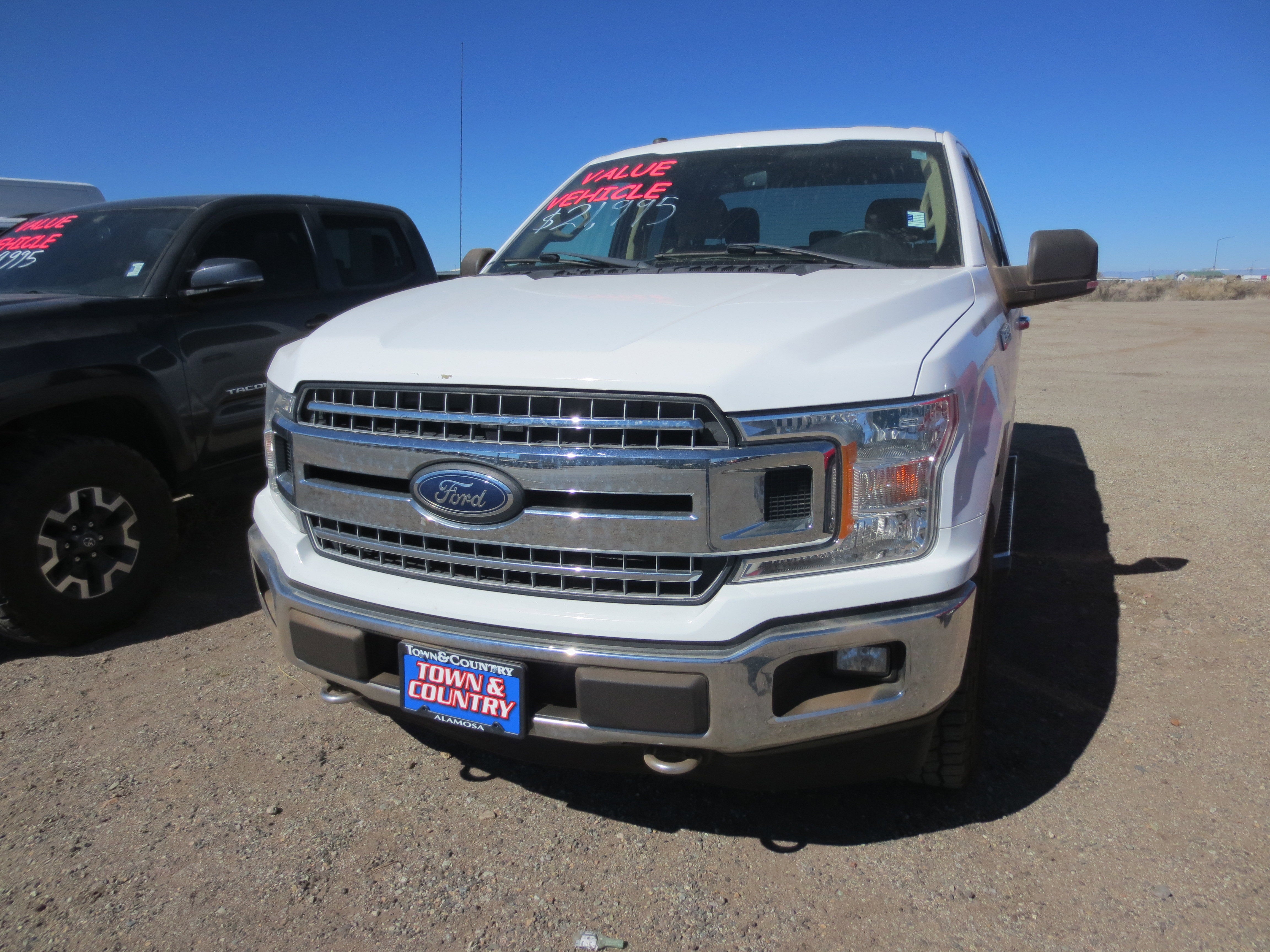 2018 Ford F-150 XL in Oxford White — front three-quarter view