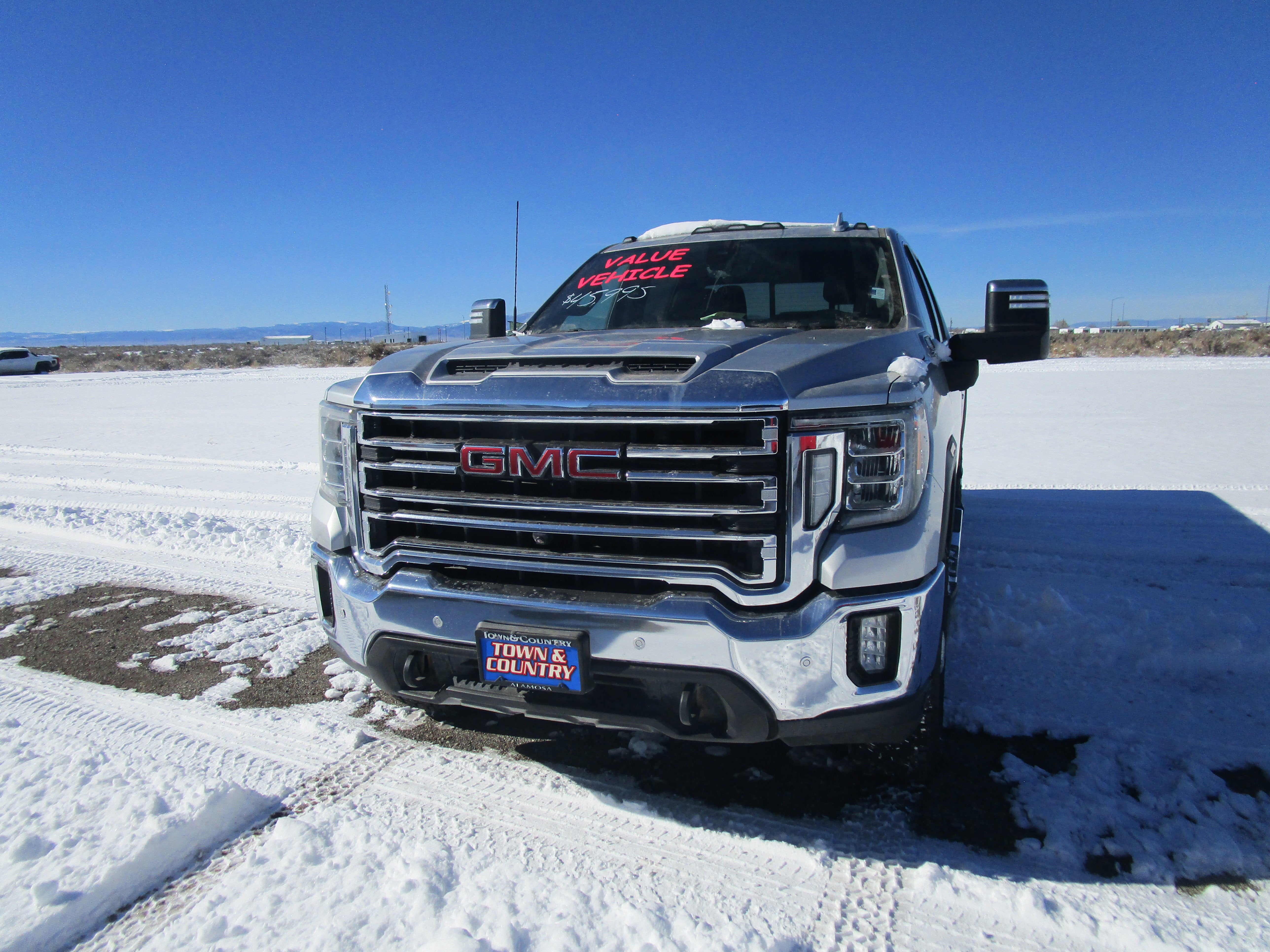 2020 GMC Sierra 2500 HD SLT in Quicksilver Metallic — front three-quarter view