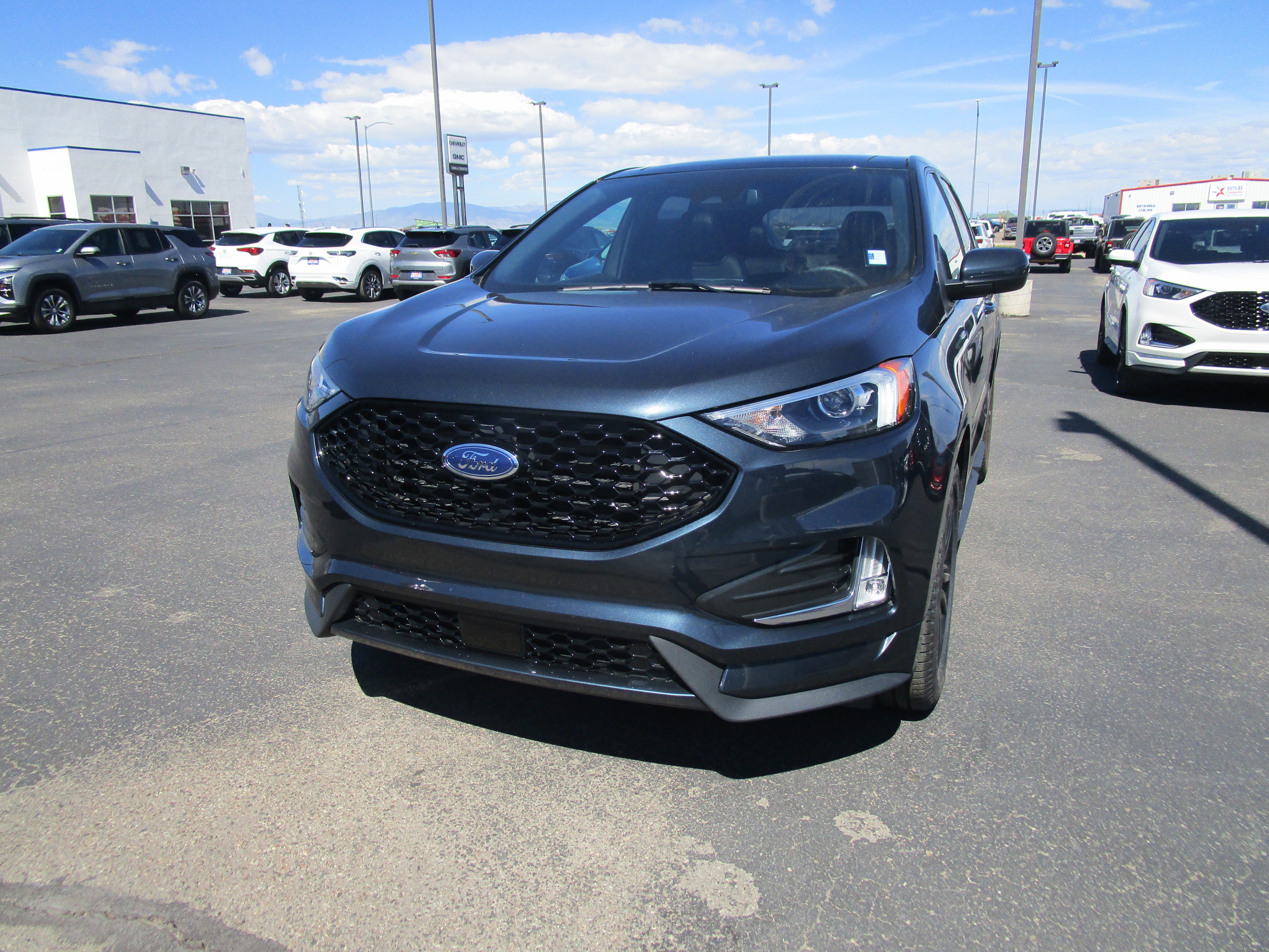 2023 Ford Edge SEL in Blue — front three-quarter view