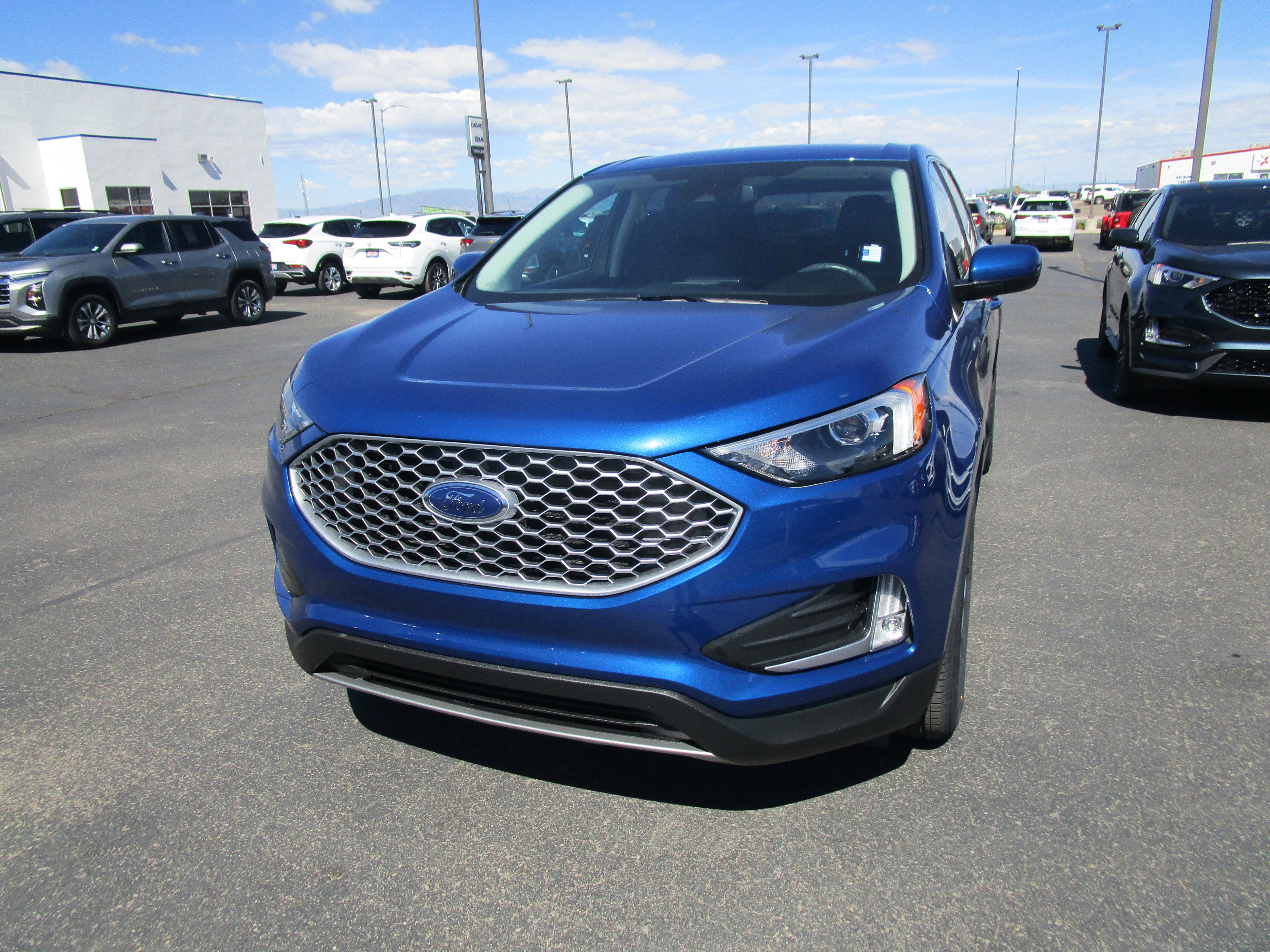 2023 Ford Edge SEL in Blue — front three-quarter view